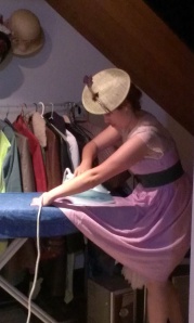Woman ironing the front of her skirt